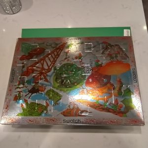 A Swatch Limited Edition GZ900 Seasons Greetings Advent Calendar, issued in 1997. doors unopened